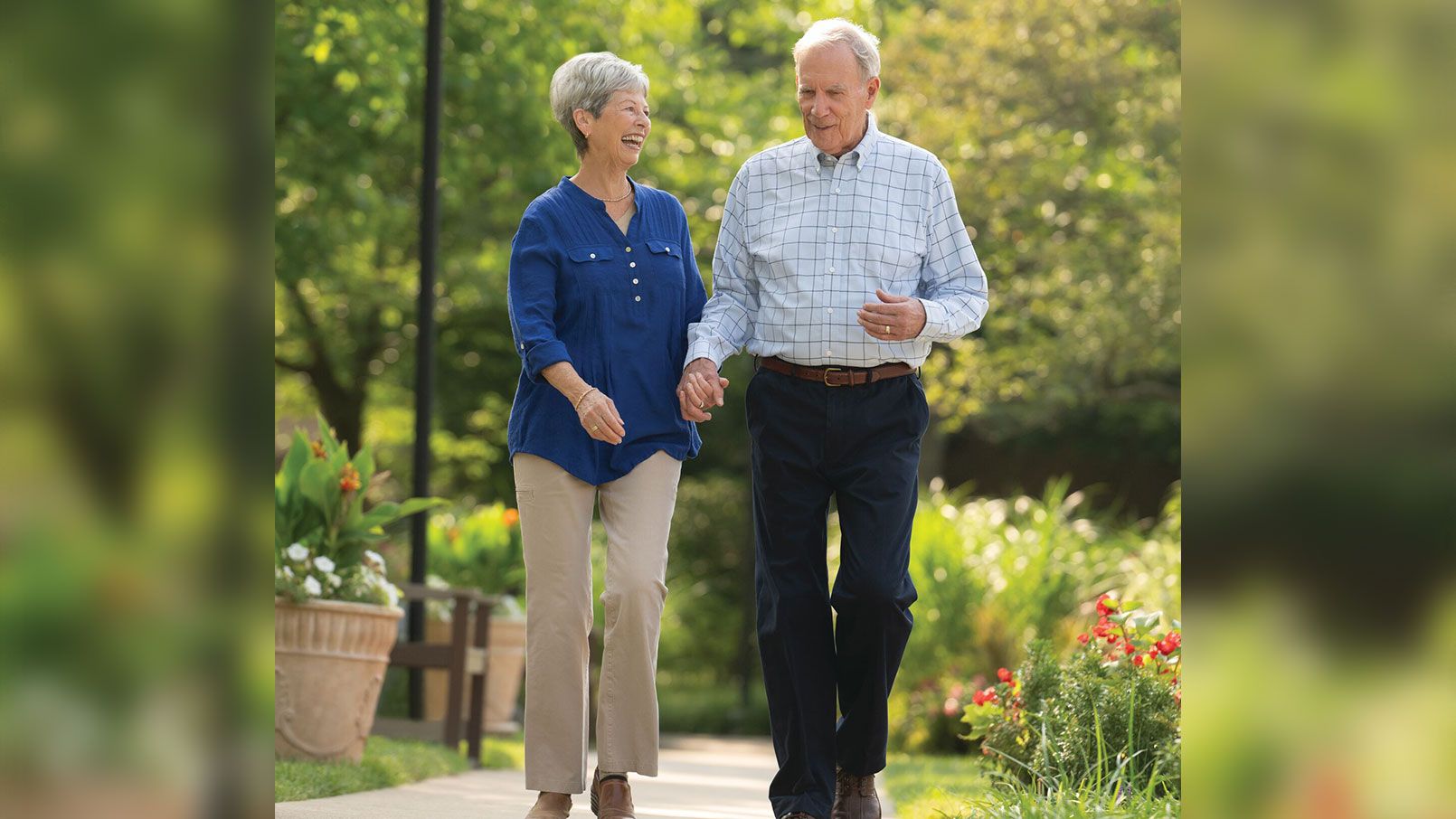 Two residents enjoying an outdoor walking path